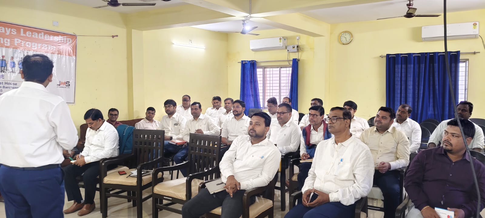 An in-person leadership development programme session with JMS Mining leaders